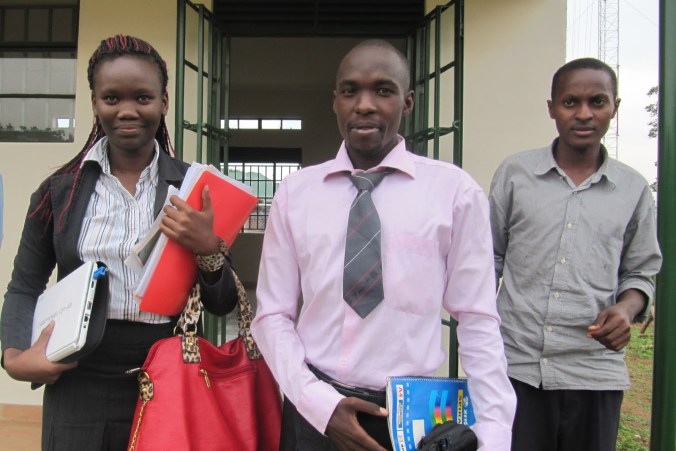 cbs-radio-journalist-ronald-ssembuusi-middle-leaving-court-with-hrnj-uganda-lawyer-catherine-anite-left